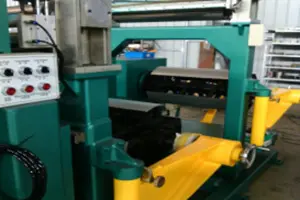 3-2，Picture of decoiler with off-set regulation system